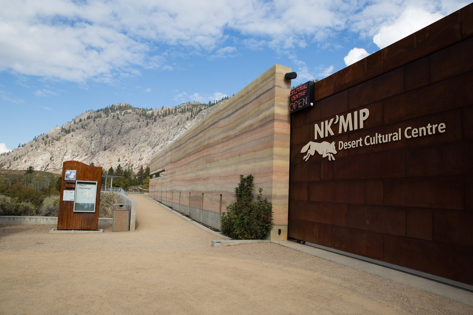 Long striped rammed-earth wall at the Nk'Mip Desert Cultural Centre in Osoyoos, BC